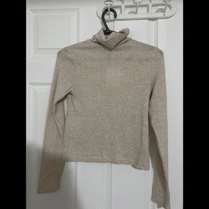 Zara: Light beige turtleneck